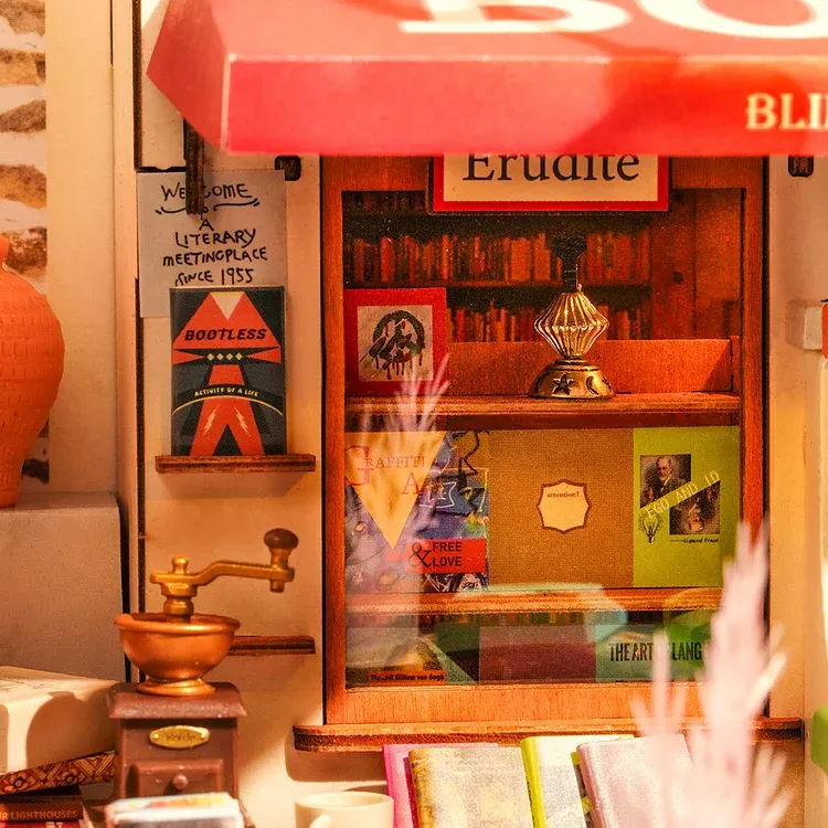 Display window of the Rolife Corner Bookstore showcasing unique books and antiques.