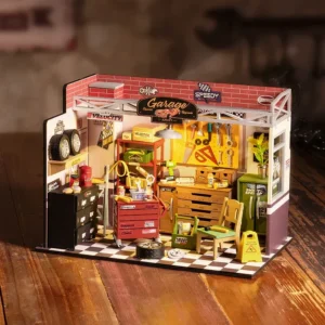 Fully assembled Rolife Garage Workshop kit on a wooden table with LED lighting.