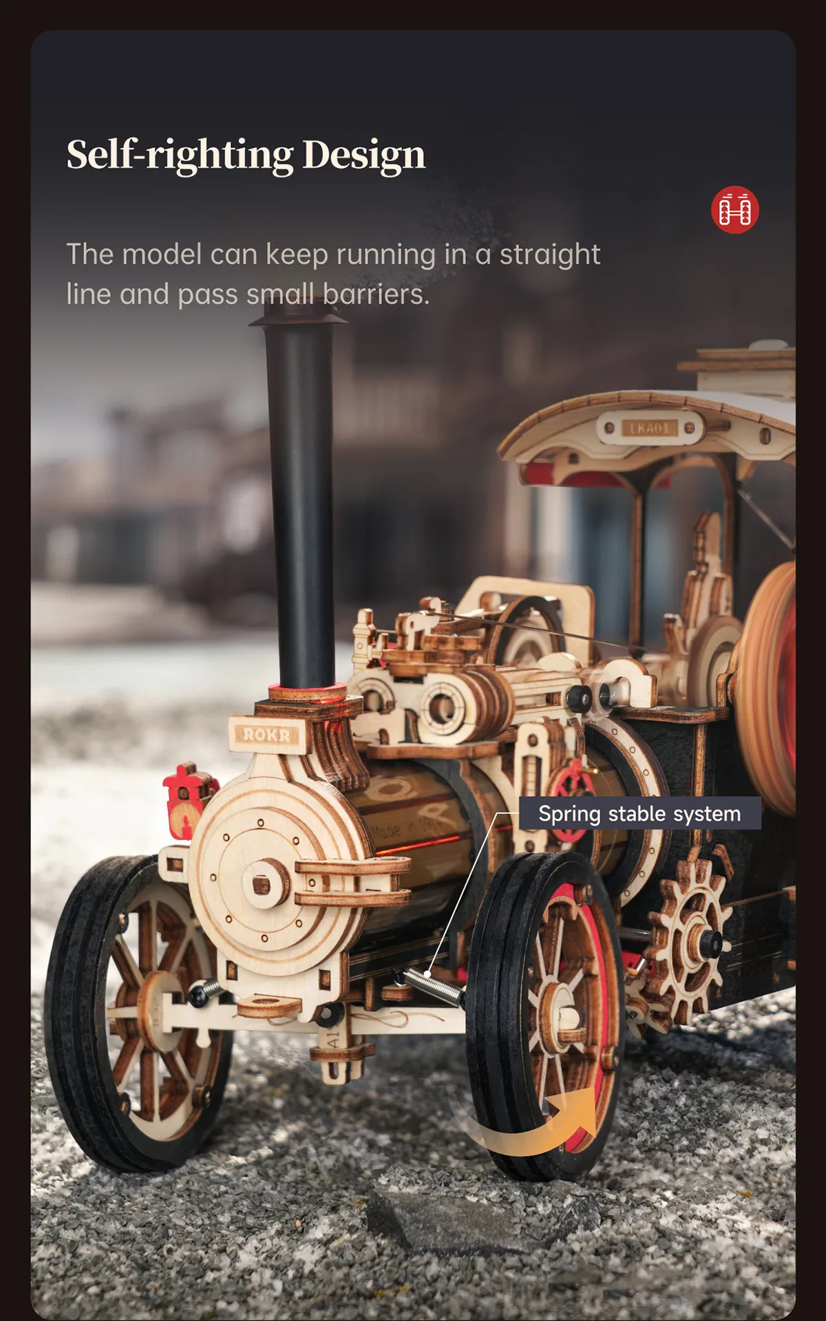 Close-up of the Rokr Steam Engine self-righting suspension system, enabling it to run straight and pass small barriers.