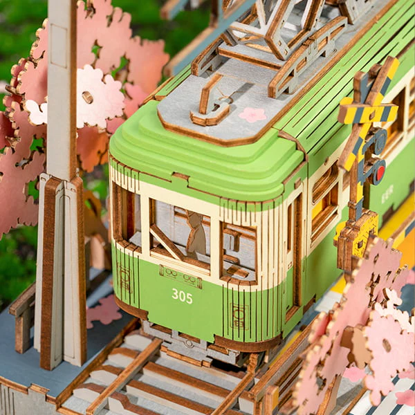 Close-up of the Sakura Journey 3D Wooden Puzzle, highlighting the Japanese tram details.
