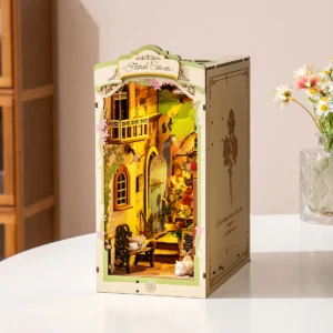 Rolife Floral Corner Book Nook on white table with flowers in a clear glass vase.