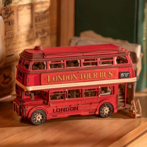 Fully assembled Rolife London Tour Bus 3D Wooden Puzzle kit displayed on a wooden shelf with nostalgic newspaper articles and books in the background.